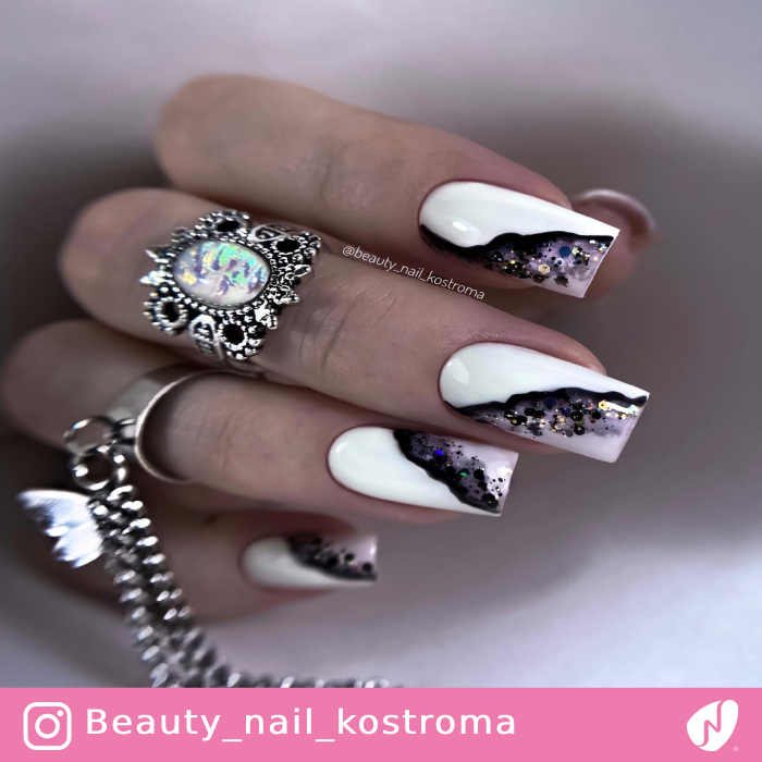 Diagonal Split Black and White Nails